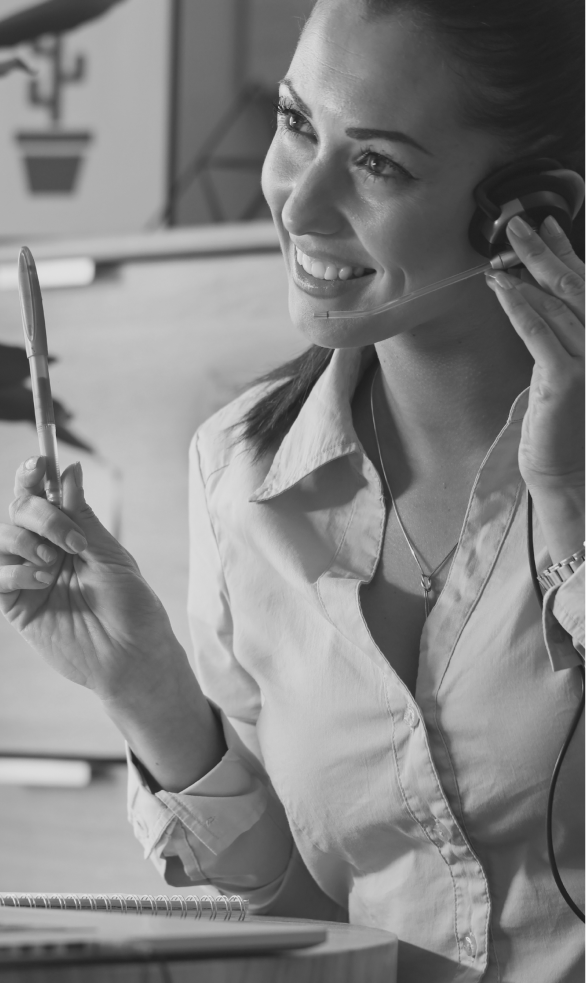 happy-customer-service-representative-with-headset-communicating-with-customer-while-working-call-center 1